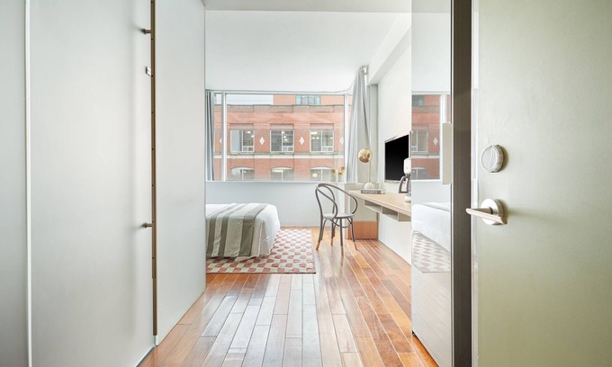 Fashion District Apartment | Sonder The Slate | Queen Room