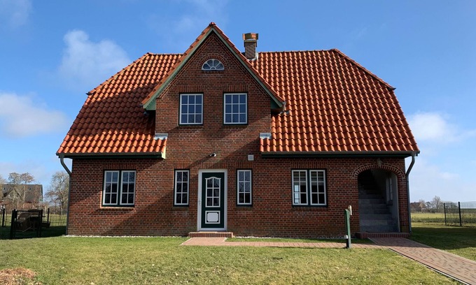 Vollerwiek Apartment | Sonnerwachen, Ferienwohnung in "De Feerjenhusen" am Haubarg von Vollerwiek