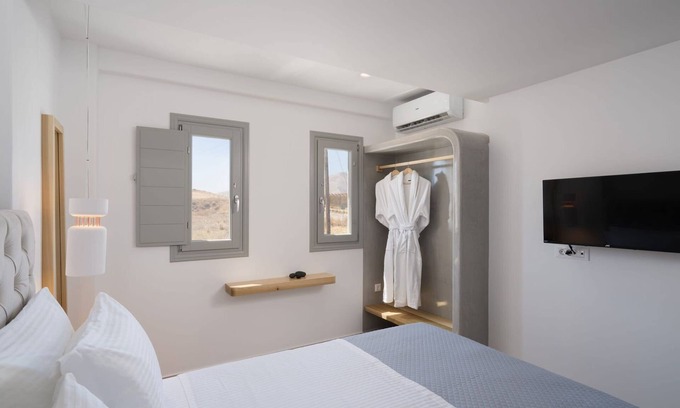 Monolithos Villa | Sophisticated Santorini Suite | Two Bedroom Suite with Private Hot Tub |.