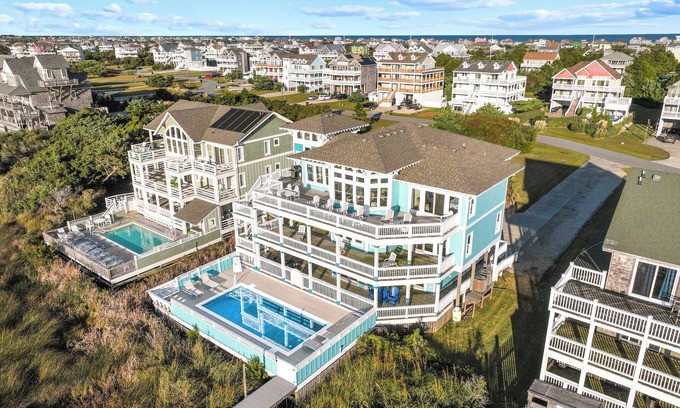 Wind Over Waves House | Soundfront, Pool, Hot Tub, Elevator, Private Dock, Boat Ramp, & Game Room