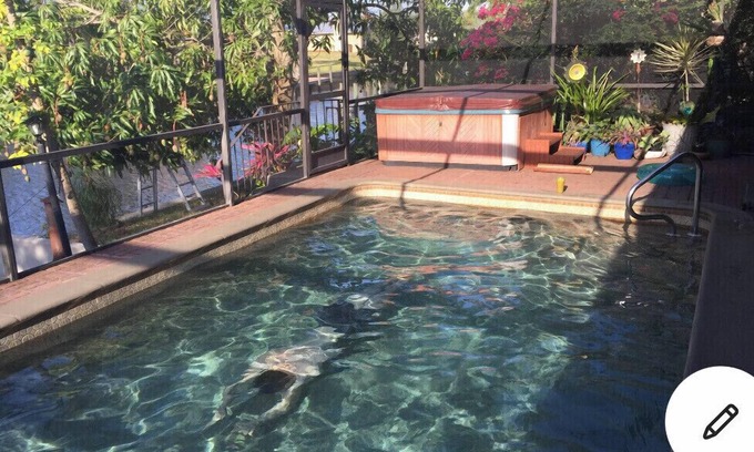 Caloosahatchee House | Southfacing Sunrise/Sunset Pristine Canal, Screened Pool, Lanai, Hot Tub!