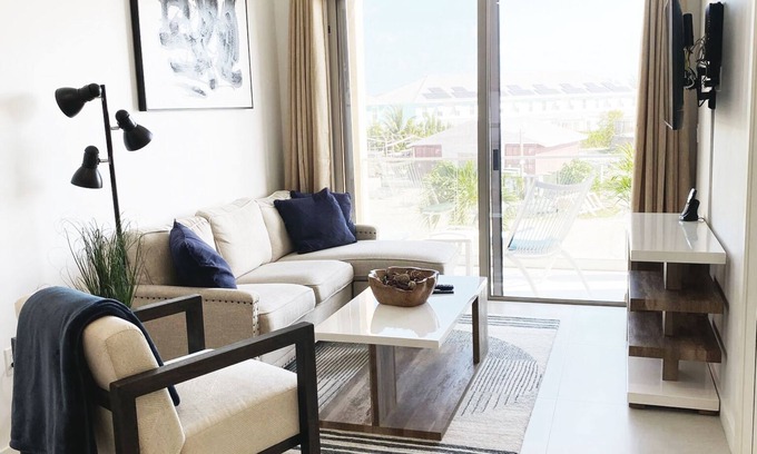 Grand Harbour Apartment | Spacious 1BR with Rooftop Pool, Island Views, Full Kitchen & Washer/Dryer