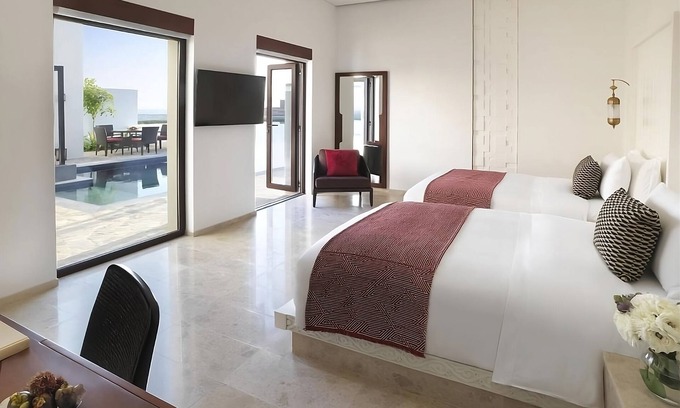 Salalah House | Spacious 2BR Seafront Accommodation! Outdoor Swimming Pool and Spa Center!
