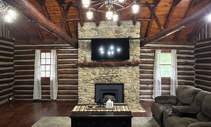 Moberly Other | Spacious 5-bedroom log cabin home with 2 ponds and 50 acres just outside Moberly