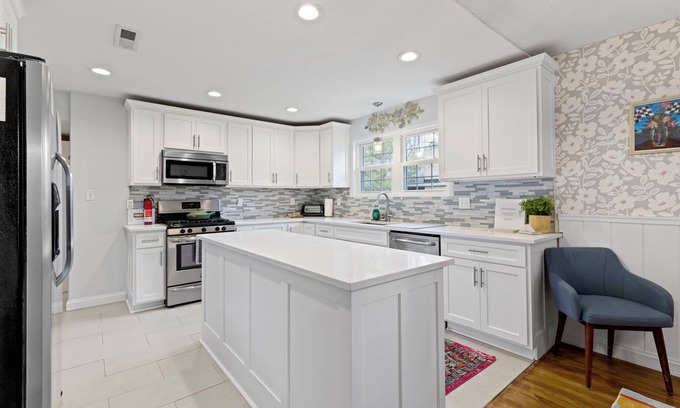 Indianapolis House | Spacious 5-bedroom house w/1.5 Kitchens & Beautiful Yard near Broad Ripple