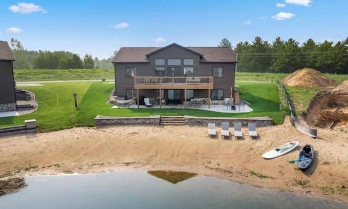 New Lisbon House | Spacious 5BR Lakefront Retreat with Kayaks, Private Beach, Arcade, and Firepit