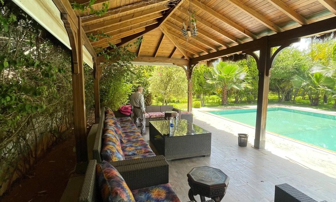 Oulad Slama Villa | Spacious 6-bedroom villa in delightful Kenitra with AC, fitness room, WiFi