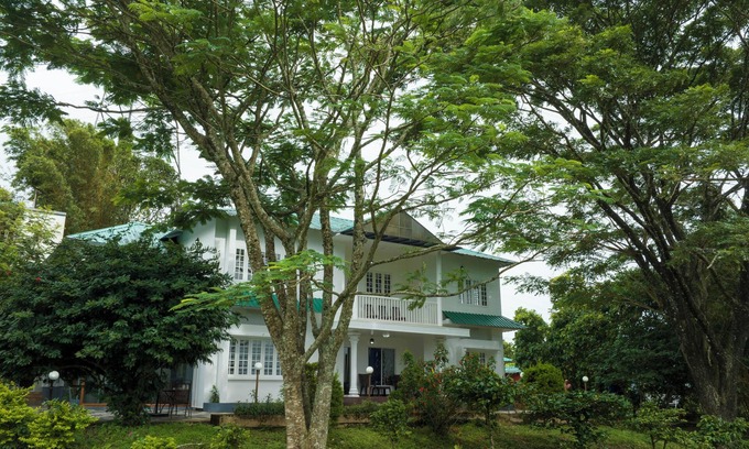 Kannan Devan Hills House | Spacious 7-bedroom bungalow in lovely Munnar with WiFi