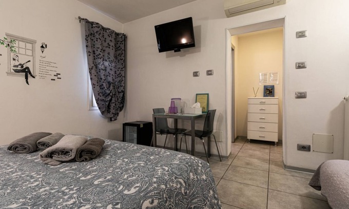 Porotto House | Spacious and bright gray room in country setting with pool