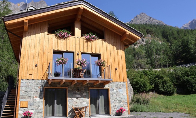 Bionaz Apartment | Spacious and bright studio apartment with large windows and a beautiful view of the mountains.