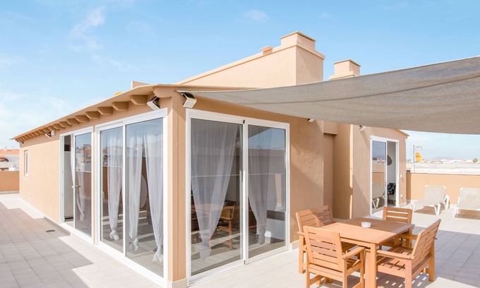 Corralejo Apartment | Spacious Apartment “Ático deluxe Corralejo centro” Close to the Beach with Sea View