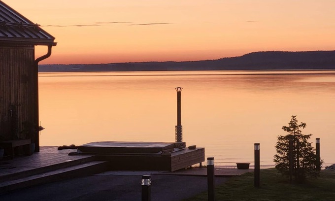 Sotkamo Villa | Spacious beachfront Villa with Panoramic views and outdoor sauna by the Lake.