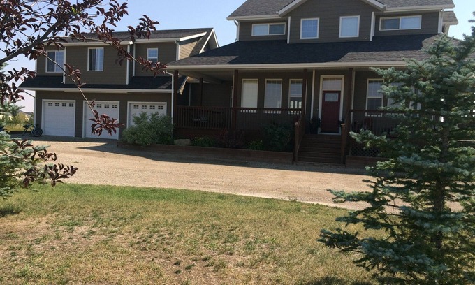 Okotoks Apartment | Spacious Carriage Suite in the Peaceful Foothills of the Canadian Rockies!