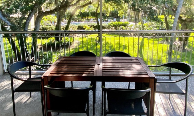 Indian River Shores Condo | Spacious condo with views of oak canopy, gardens & pool. 5-minute walk to beach.
