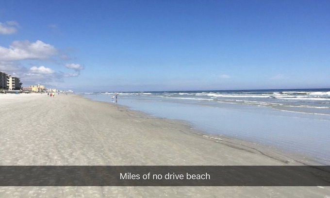 New Smyrna Beach Condo | Spacious condo in desirable Ocean Walk complex with ocean views & large balcony!