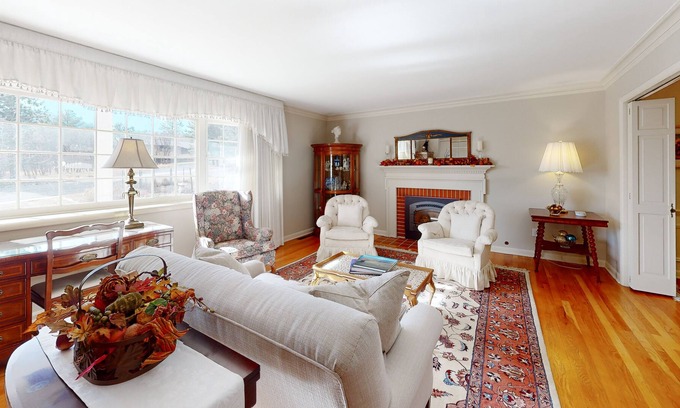 Skyway House | Spacious estate with fenced yard, private pond, outdoor fireplace, & home gym