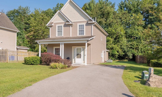 Christiansburg House | Spacious family home with multiple bedrooms, full kitchen, porch, and quaint backyard.