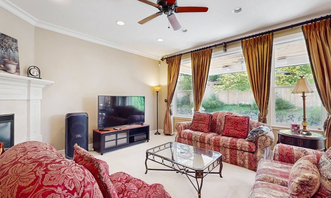 Renton House | Spacious getaway home with fireplace, private patio & grill