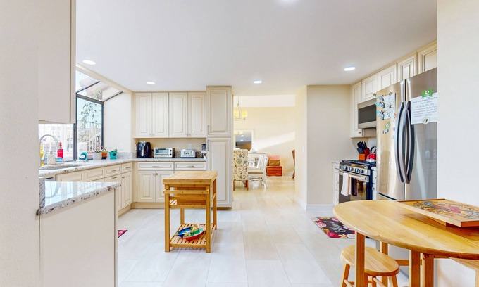 Guajome House | Spacious home in a great location with firepit, grill, games, AC, & smart TVs