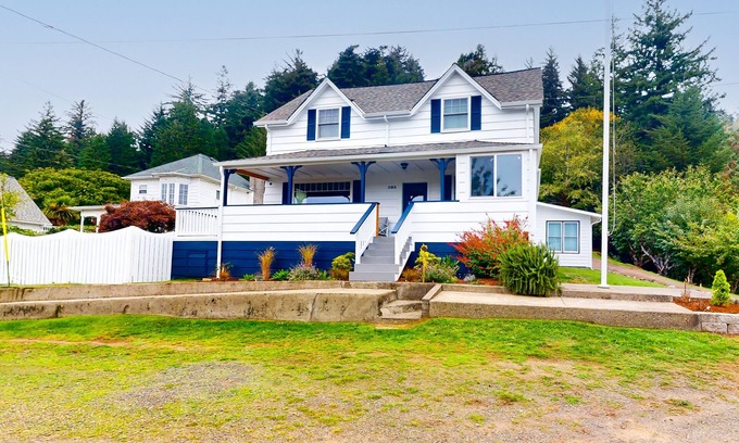 Gardiner House | Spacious home with river views, hot tub, covered porch, deck, grill, & W/D