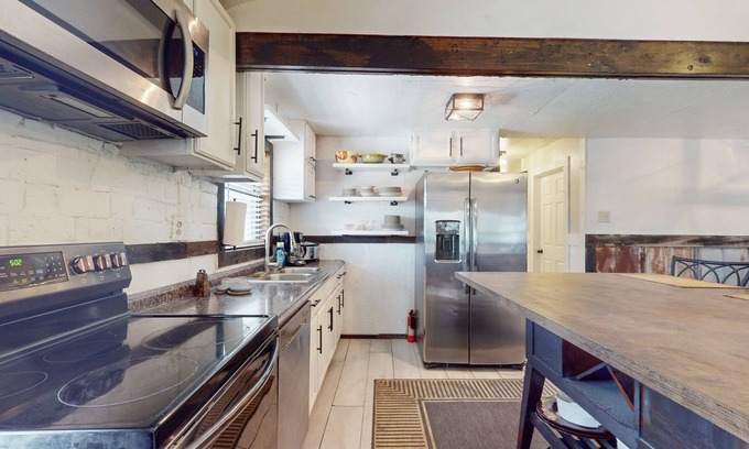 Somerville House | Spacious house with firepit, wraparound porch, pavilion + dog friendly