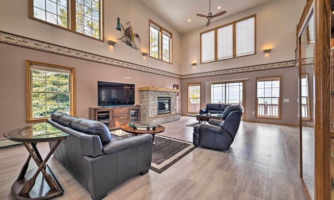 Rogers City House | Spacious Lakefront Home w/Sunroom & Bar!