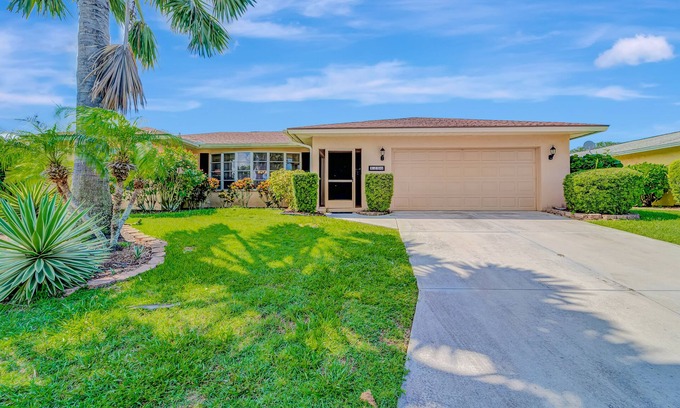 Venice Gardens House | Spacious lakeside home with modern kitchen, heated pool, and central AC