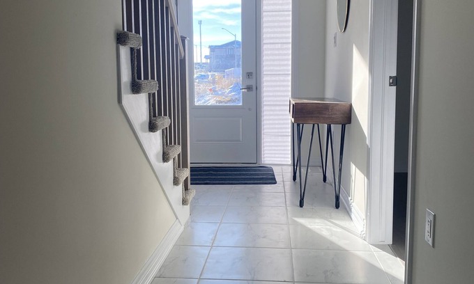 Cambridge House | Spacious luxurious townhouse with double car garage.