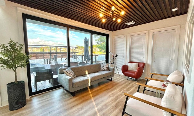 April Sound House | Spacious Luxury Lakefront Home with Pool and Jacuzzi, Firepit, and Game Room!