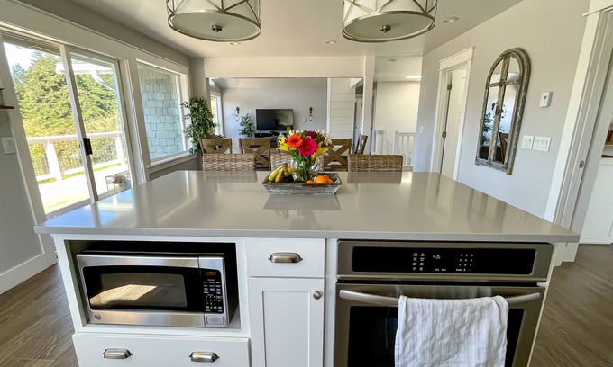 Eastsound House | Spacious & modern house with game room, outdoor firepit & peek-a-boo water views