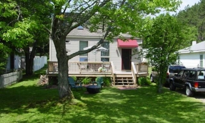 Cadillac House | Spacious, open, 3-Bedroom 2 bath House with Lake Mitchell views