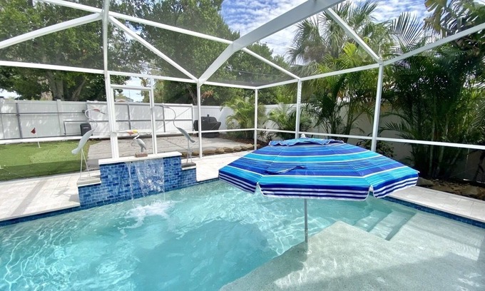 St. Petersburg - Clearwater House | Spacious Pool House w/Mini Golf 5 min from the beach!