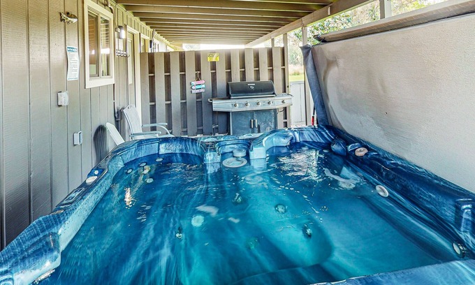 Southeast Bend House | Spacious retreat with private hot tub, dog-friendly, arcade