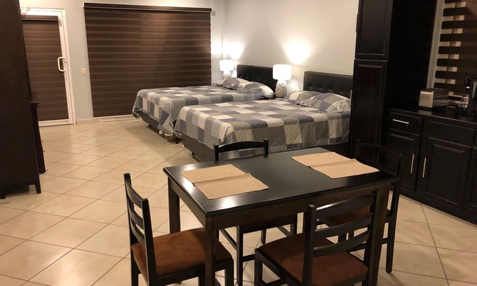 San Pedro Sula Apartment | Spacious Studio Apartment . Secured and quiet building with garage on premises