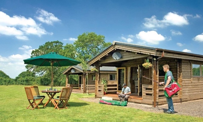 Cullompton Ski Chalet | Spacious timber lodge with one double and one single in one room.