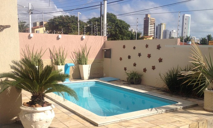 Ponta Negra House | Spacious, ventilated and welcoming.