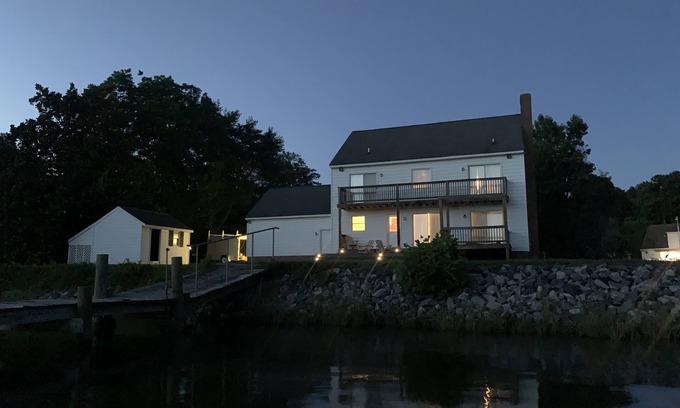 Kilmarnock House | Spacious waterfront home with dock and sunset view