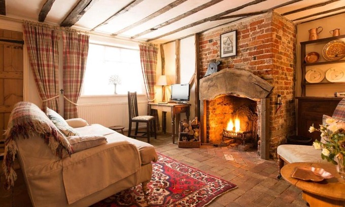 Long Melford House | Spadgers, a flax workers cottage next to fields in a Medieval Village