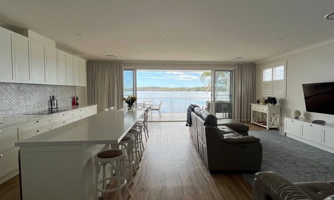 Bonnells Bay House | Sparkle by the Lake at this peaceful direct waterfront luxury homenSleeps 10