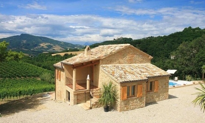 Porchia House | Spectacular views across the pool to mountains and historic village.