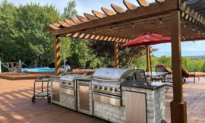 Algoma District House | Spectacular city & water view 1 bedroom apt with huge deck