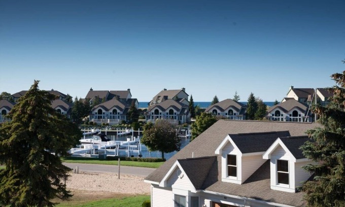 Manistee House | Spectacular Three Story Condo with Beach Like Feel