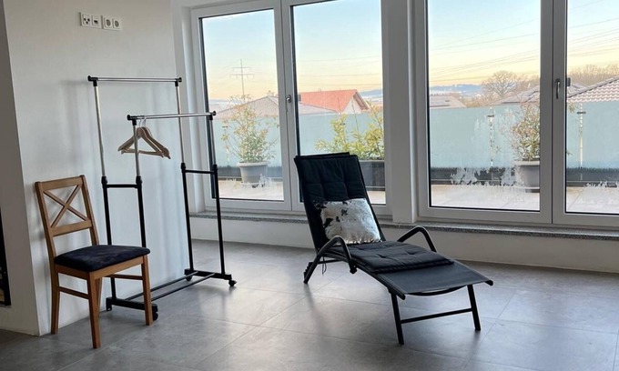 Wallersdorf Apartment | Spectacular top floor gallery apartment w. Dream panorama & excellent terrace.