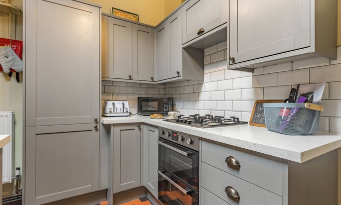 Tunstall Cottage | Spend an evening relaxing by the wood burner after a day exploring the local walks and attractions.