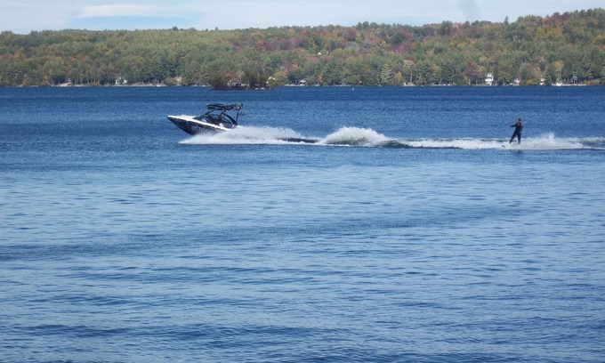 Laconia House | SPLASH. CAN'T GET CLOSER TO THE WATER! WATERFRONT HOME BOAT HOUSE &BOAT SLIPS