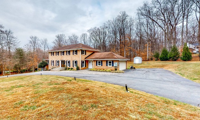 Potomac House | Sprawling Estate with Private Tennis Court & Outdoor Kitchen, Wood Fireplaces