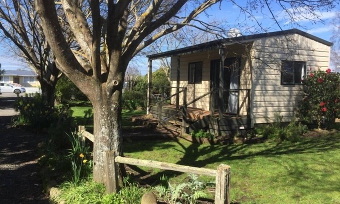 Greytown Cottage | Stand alone cottage in tranquil garden, with balcony, pergola, SkyTV, free Wifi
