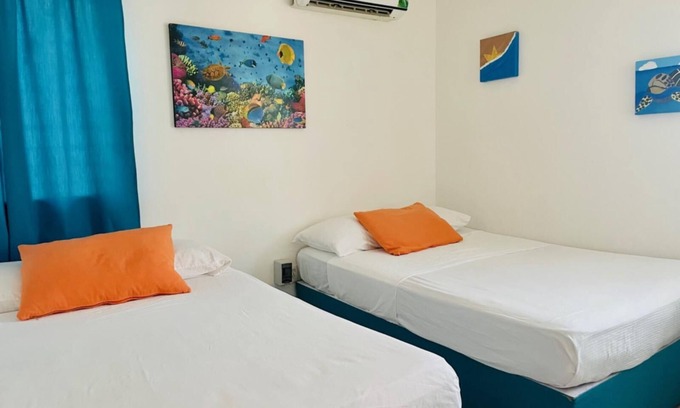 Punta Sam Apartment | Standard Quadruple Room