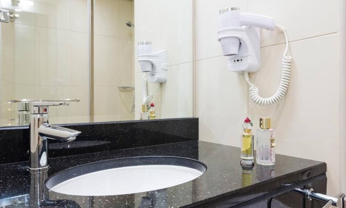 Al Muraqqabat Hotel | Standard Room Near Westzone Supermarket Rigga By Luxury Bookings