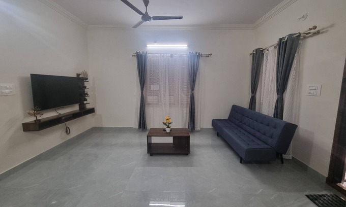 Sahakar Nagar House | Stay at your comfort of a home with basic cooking range and comfortable beds.